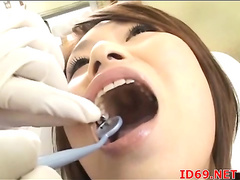 Asian babe visits her dentist
