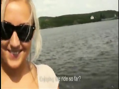 Busty blonde gets paid for showing her huge boobs on a boat
