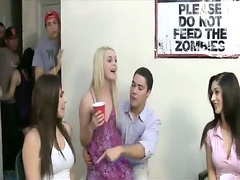 Students drinking tequila of girls tits