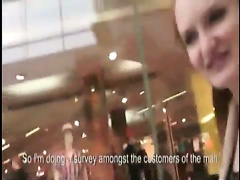 Redhead rides on a dick in a public mall