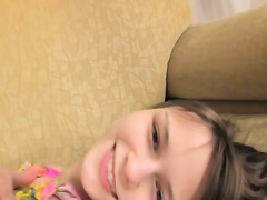 Busty teenager fingering sleek pussy