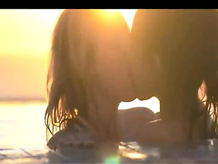two lesbians kissing his body