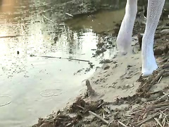 blonde on the beach showing her pussy